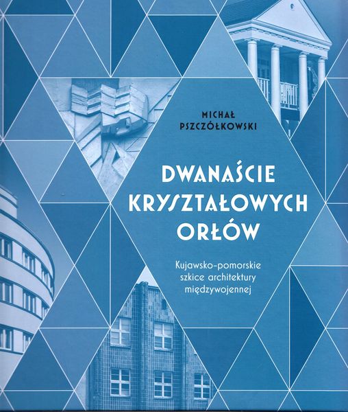 Na okładce: Niebieskie trójkąty i budynki