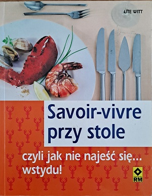 okładka książki: Savoir-vivre przy stole czyli jak nie najeść się...wstydu! Na okładce widoczny talerz z posiłkiem oraz sztućce.